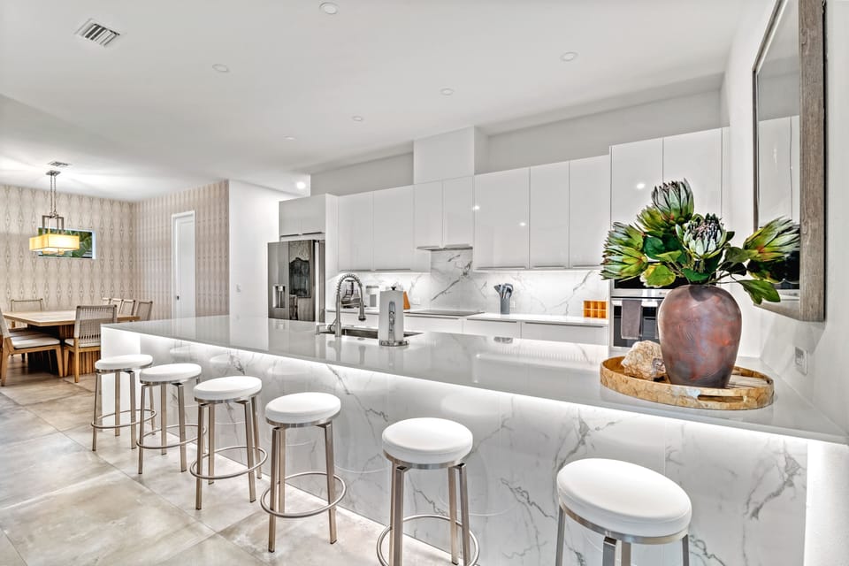 Bright and spacious, the kitchen offers everything you need to cook, sip, and savor every moment of your vacation.