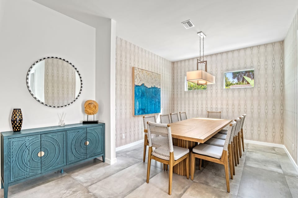 An intimate dining setting that effortlessly blends comfort and style, ideal for both casual meals and special occasions.