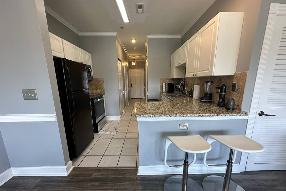 Unit has a full-size kitchen.