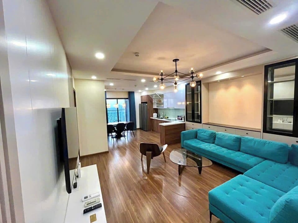 Basic Apartment | Living area | 65-inch flat-screen TV with cable channels
