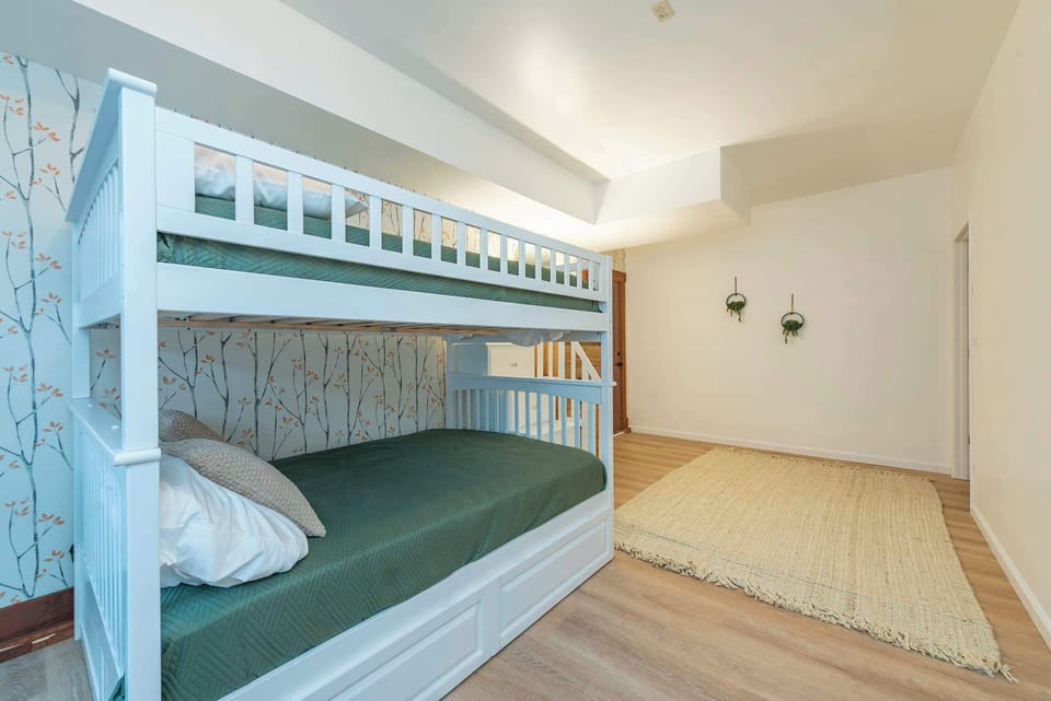 Full over full bunk bed in garage apartment downstairs