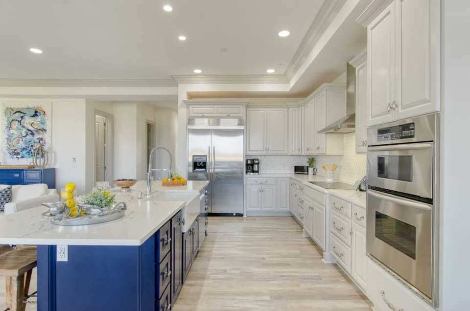 Fully equipped, gourmet chef's kitchen has everything you need for storage, prep, and serving.