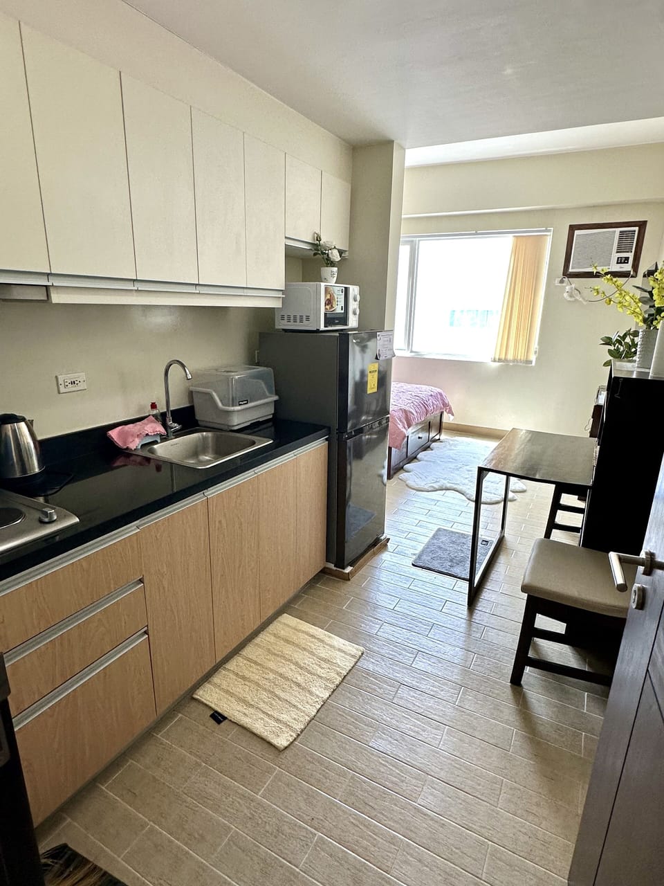 Exclusive Apartment | Private kitchen | Full-size fridge, microwave, oven, stovetop