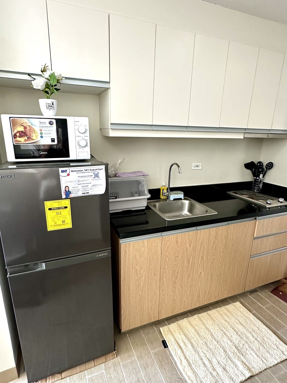 Exclusive Apartment | Private kitchen | Full-size fridge, microwave, oven, stovetop