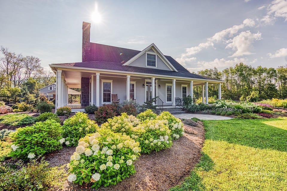 Enjoy 60 private acres with sweeping mountain views. 3-bed, 3.5-bath  including a heated pool, hot tub, central AC, and a full gym. 