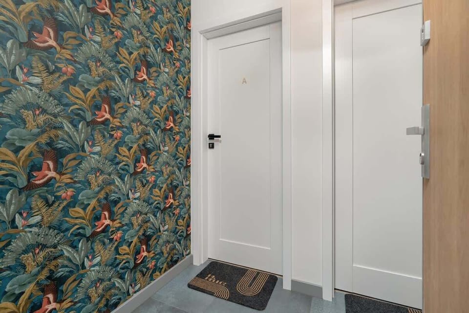 Corridor with patterned wallpaper. 