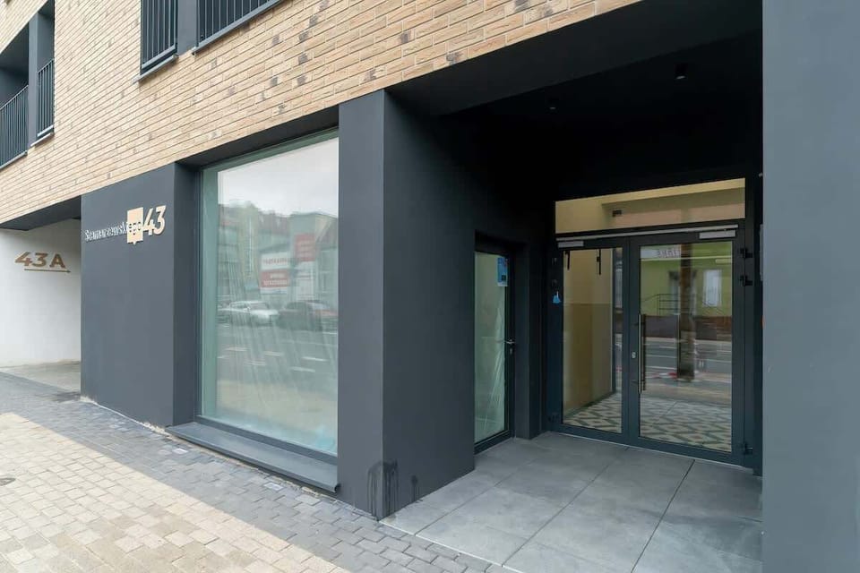 Glass entrance to the building. 