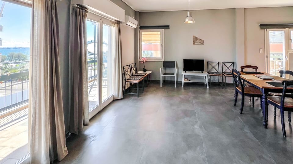 Family Apartment | Living area | 32-inch flat-screen TV with digital channels