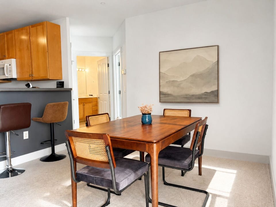 A versatile dining nook that doubles as a comfortable workspace for staying productive while you travel