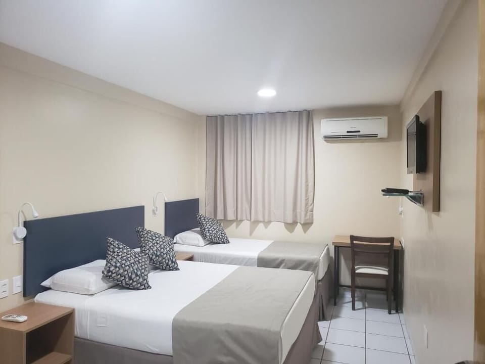 Comfort Triple Room, Mixed Dorm, Non Smoking | Minibar, in-room safe, laptop workspace, blackout drapes