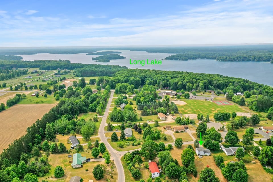 Excellent location-close to Long Lake!! Scenic Getaway: Nestled near Long Lake, enjoy vibrant greenery and serene water views!