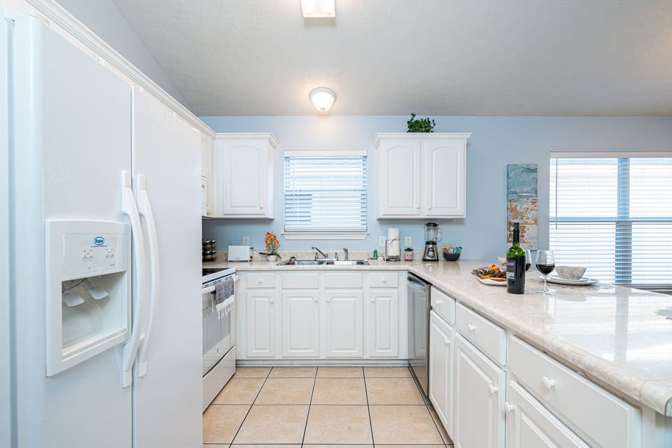 Vibrant Kitchen: Enjoy meals under a colorful glow with modern decor and spacious dining options!