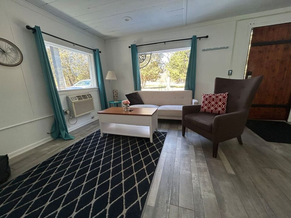 Living room with a tv for the days the weather isn`t cooperating