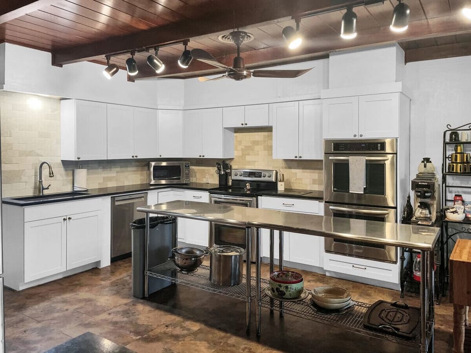 Experience the luxury of our open, fully stocked kitchen remodel, where every meal becomes a masterpiece.