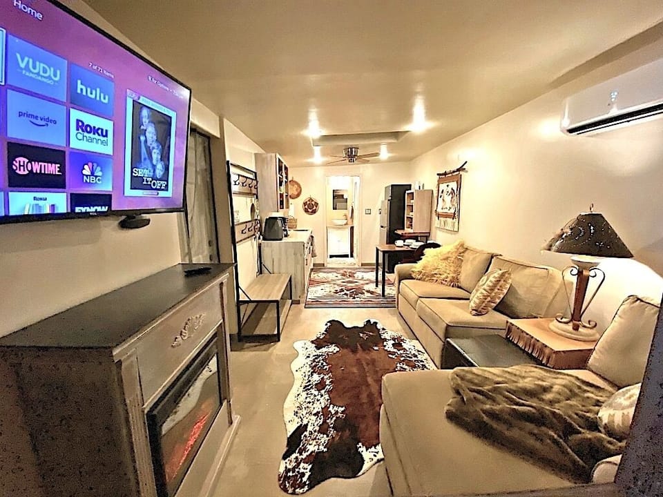 Roky TV, Firplace and Sofa area