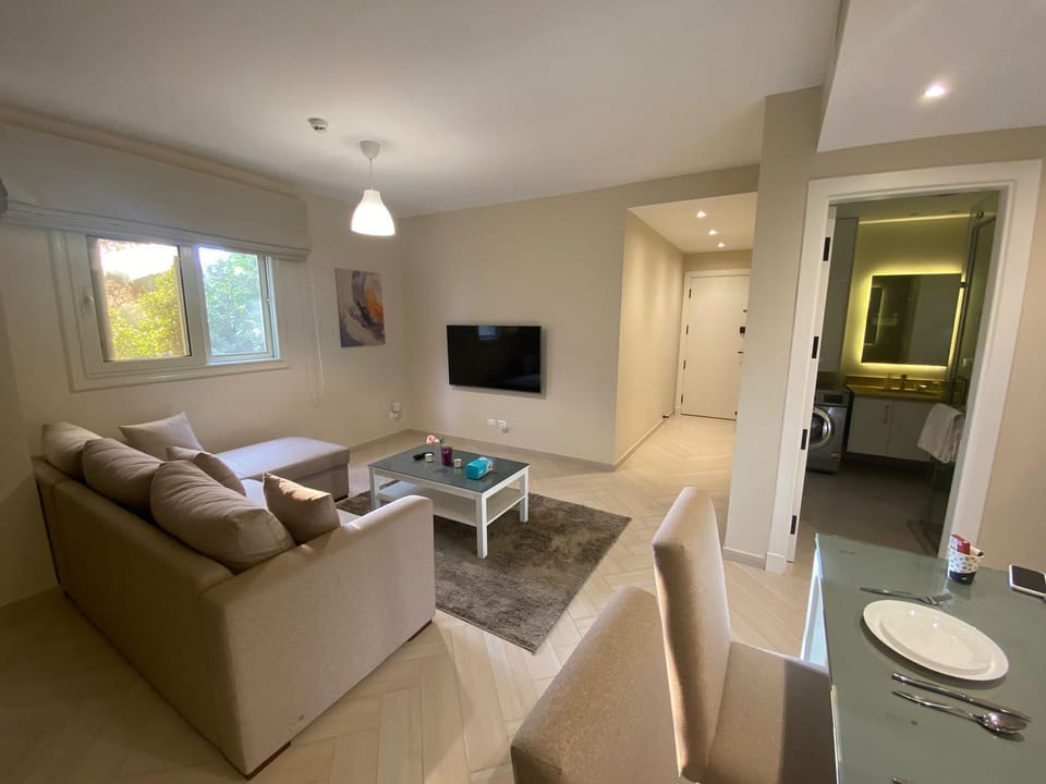 Suite | Living area | 50-inch Smart TV with satellite channels