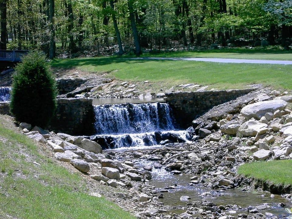 One of the low waterfalls at Mountain Greens Golf Course, Summertime.