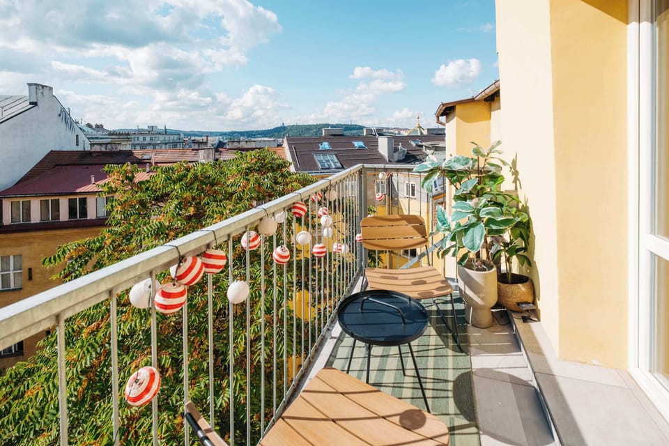 The apartment has a balcony  with outdoor seating