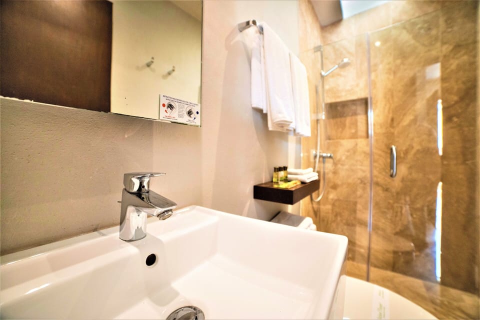Shower, free toiletries, hair dryer, towels