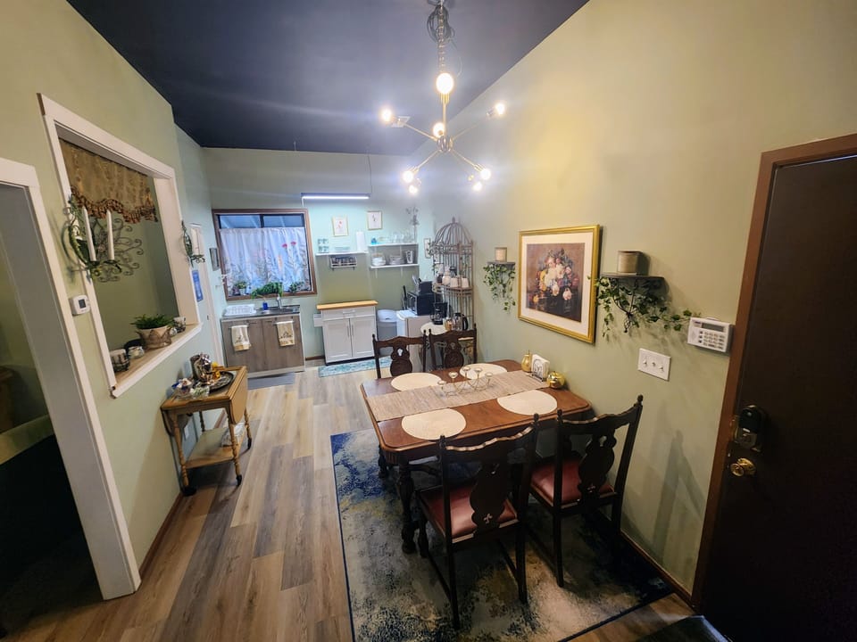 Dining open to kitchenette for easy meal prep