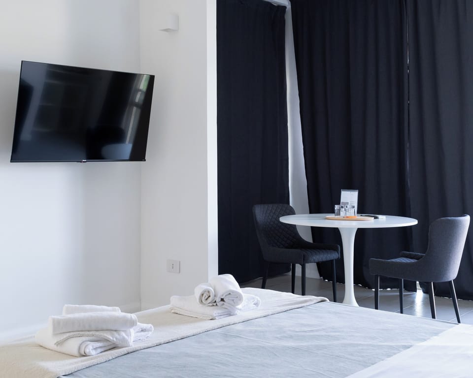 Exclusive Suite | Premium bedding, down comforters, memory foam beds, desk