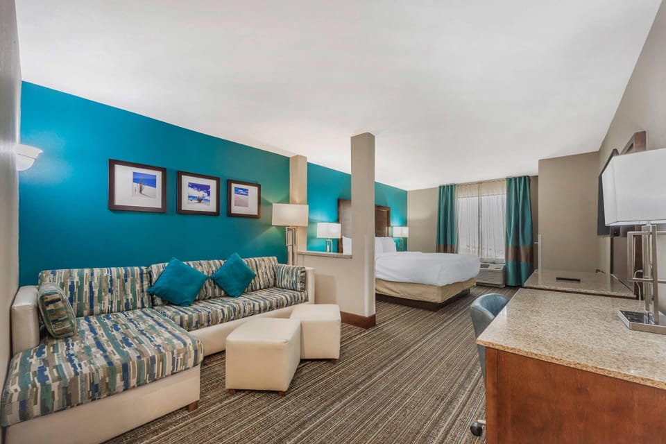 Suite, 1 King Bed with Sofa bed, Non Smoking | Pillowtop beds, desk, iron/ironing board, cribs (free)