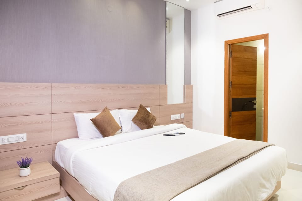 Deluxe Room, 1 Bedroom, City View | Individually furnished, desk, soundproofing, free WiFi