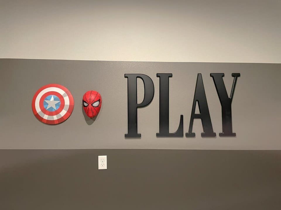 Dive into superhero adventures in this themed game room, where fun and imagination come alive!