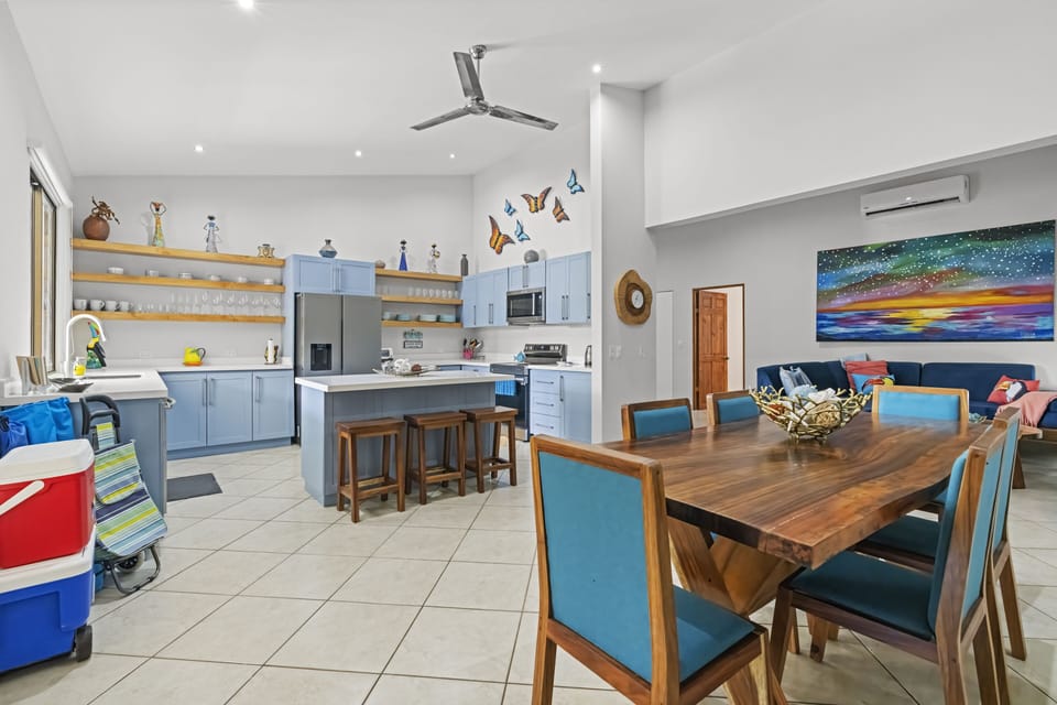 The condo has a large, open-concept living space with beautiful decor.  