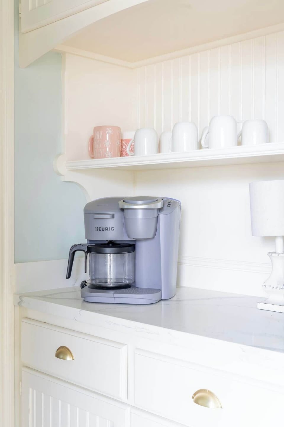 Kitchen with coffee maker.