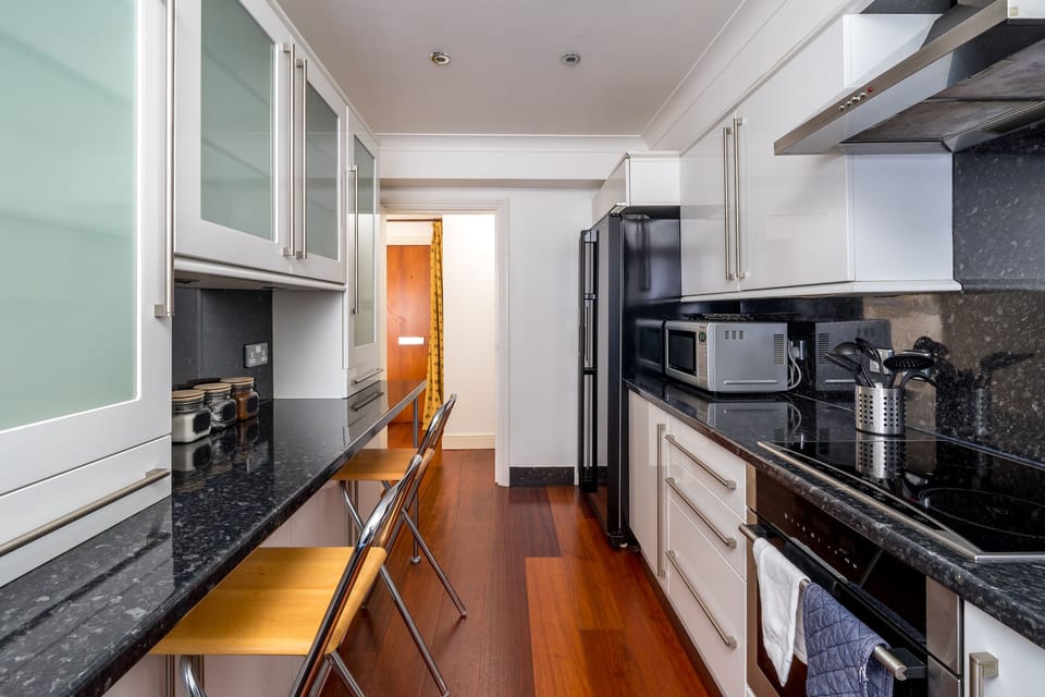 Comfort Apartment | Private kitchen | Full-size fridge, microwave, oven, stovetop