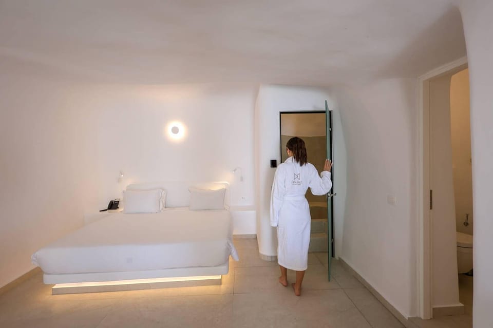 Junior Suite with hammam (Caldera View and Indoor Hot tub) | Premium bedding, down comforters, individually furnished, bed sheets