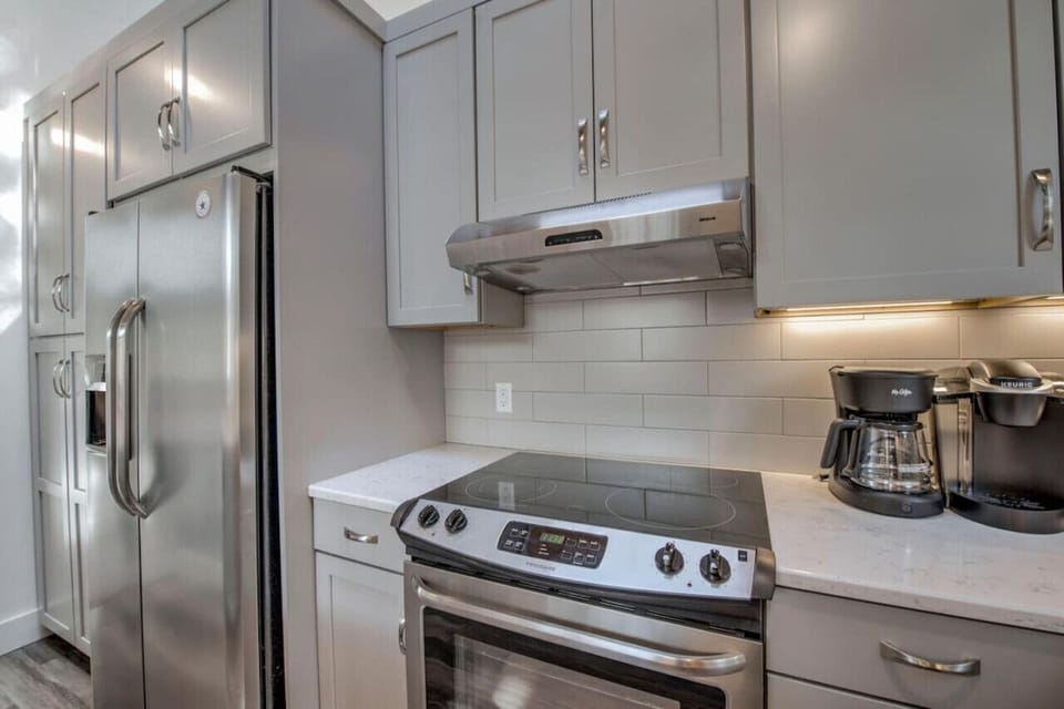 Brand new refrigerator, stove, and other appliances