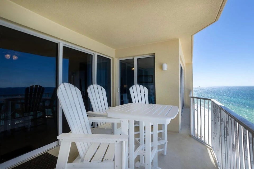 Balcony with hightop Adirondack table and seating