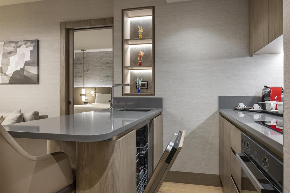 Executive Apartment (Suite) | Private kitchen | Fridge, coffee/tea maker