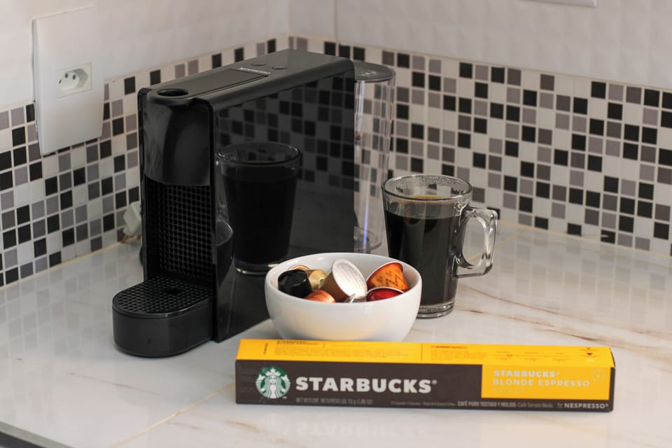 Fridge, oven, espresso maker, cookware/dishes/utensils
