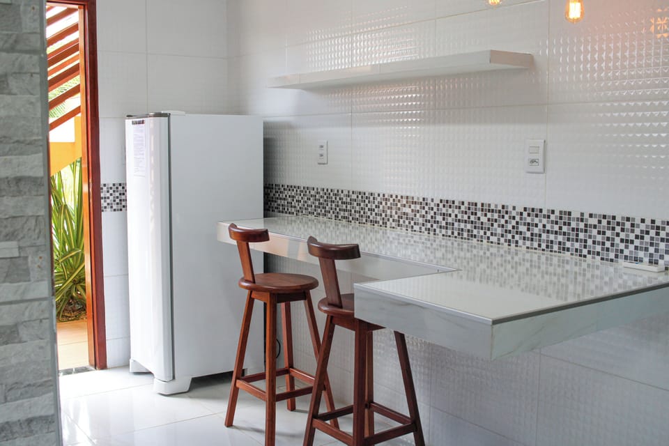 Fridge, oven, espresso maker, cookware/dishes/utensils