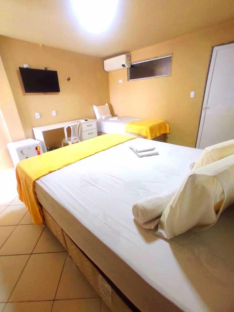 Premium Triple Room, Multiple Beds, Lanai, Sea View | Desk, laptop workspace, free WiFi, bed sheets