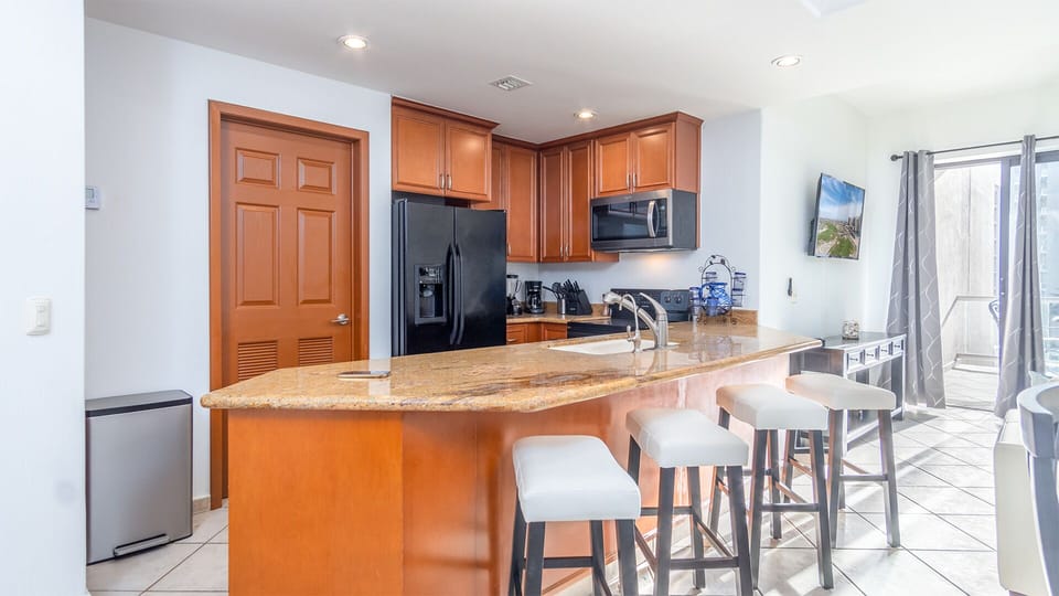 Counter top provides a comfortable space to enjoy company.