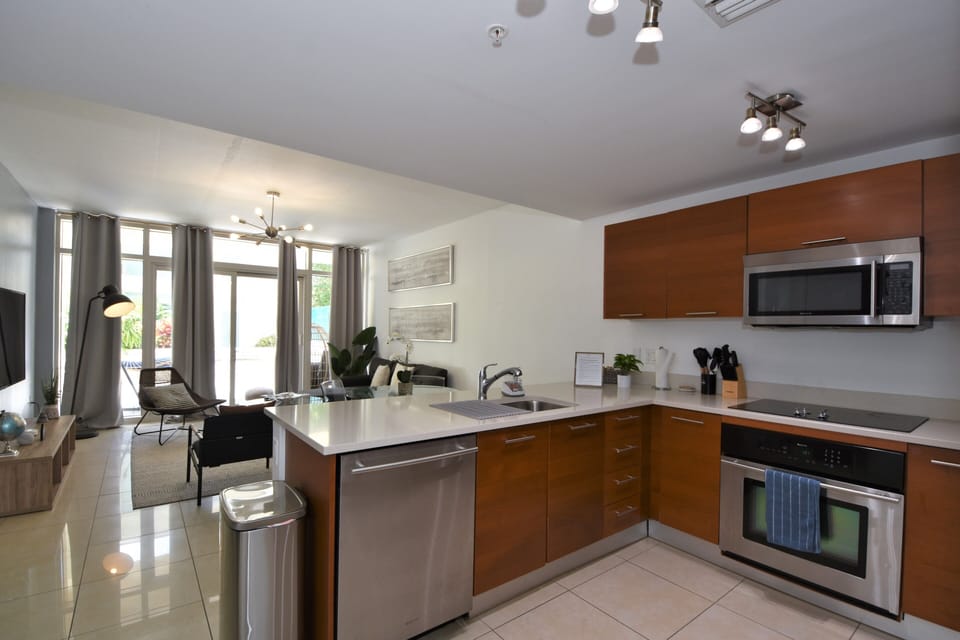 Comfort Apartment | Private kitchen | Full-size fridge, microwave, oven, stovetop