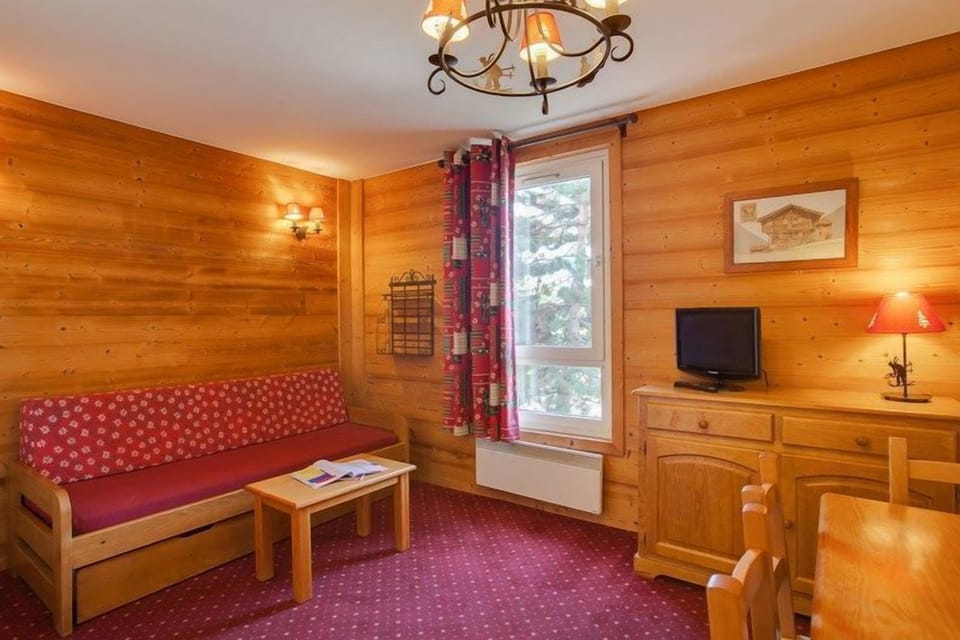 Kick back your feet and relax in the cozy living area.