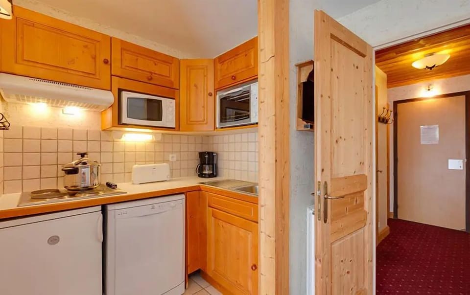 Prepare a meal in the equipped kitchenette.