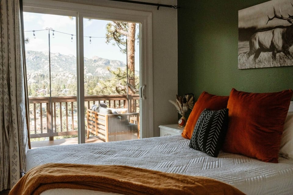 Wake up to sweeping mountain views right from bed