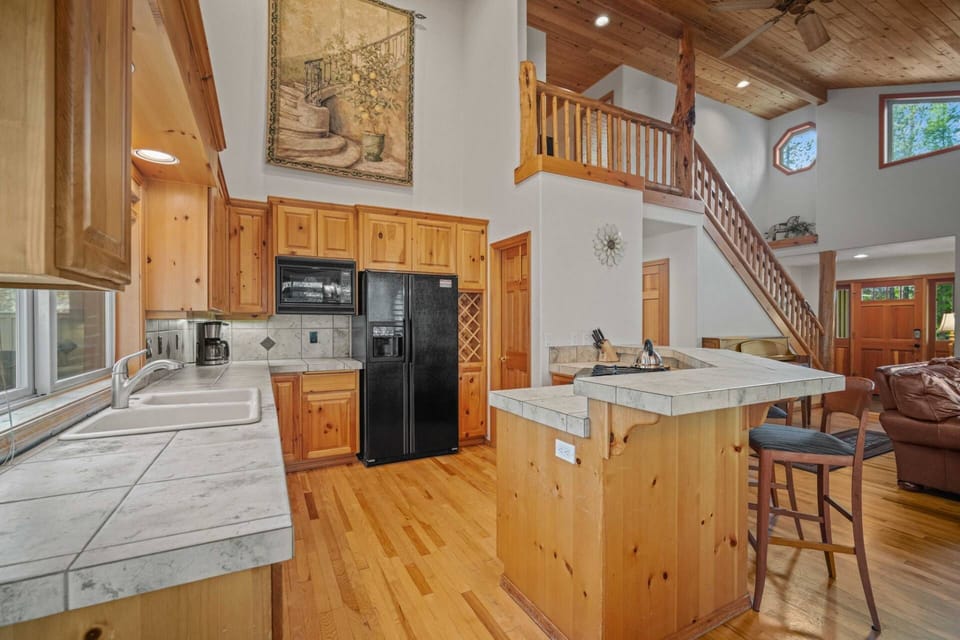 Fully equipped kitchen is ready for any culinary creation.