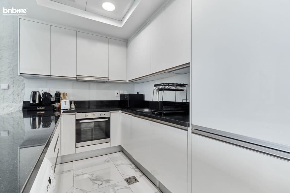 Luxury Apartment | Private kitchen | Fridge, microwave, oven, stovetop