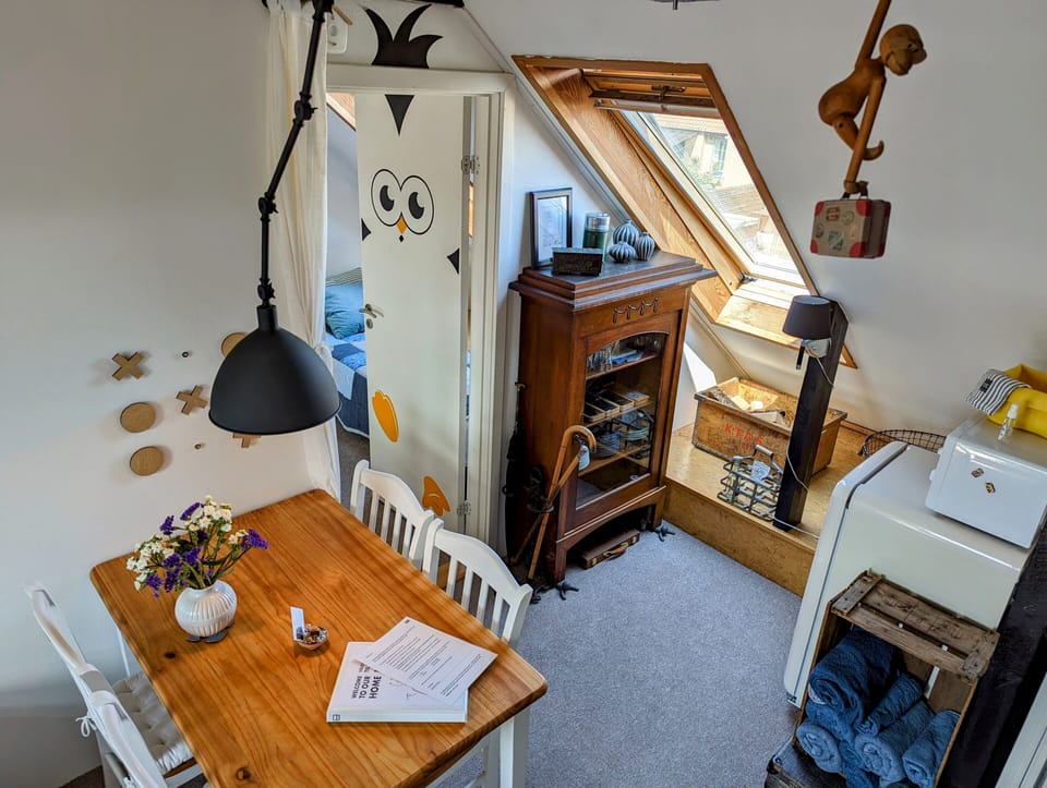View from the loft down the open room in the kitchen end