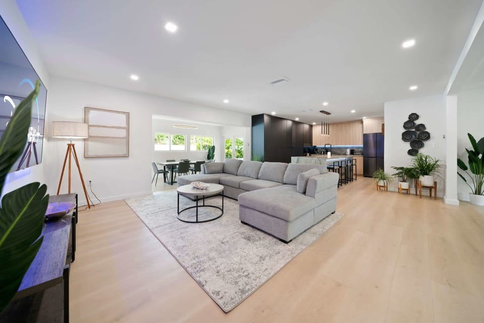 Open floor plan with large sofa sleeper