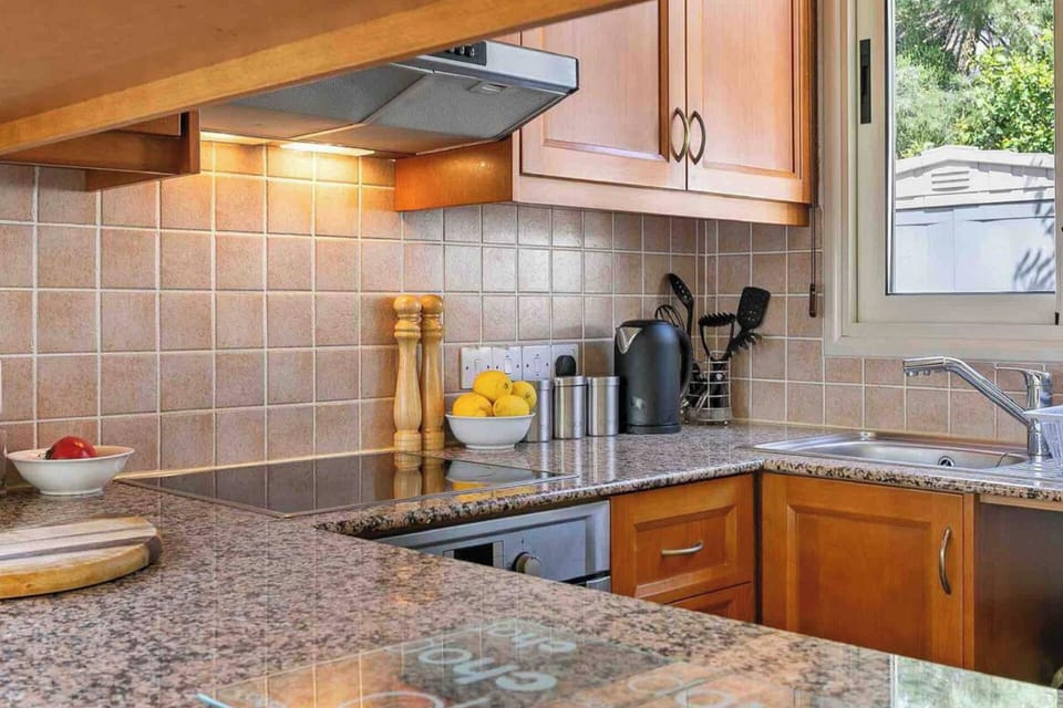Villa | Private kitchen | Fridge, microwave, oven, stovetop