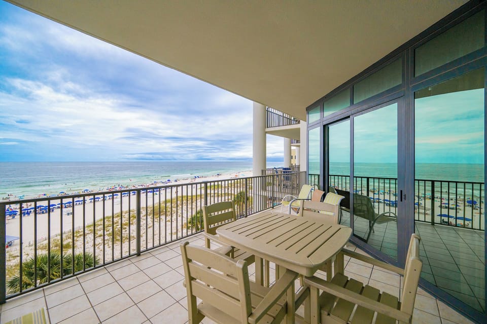 Discover beachfront balcony views from the fourth floor overlooking the pool and lazy river area with the beach steps away