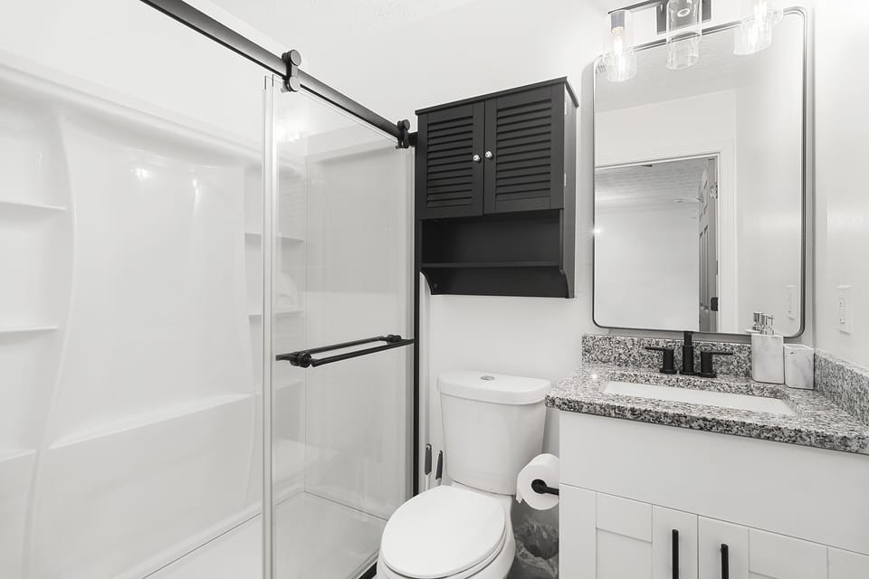 Townhome | Bathroom | Hair dryer, towels